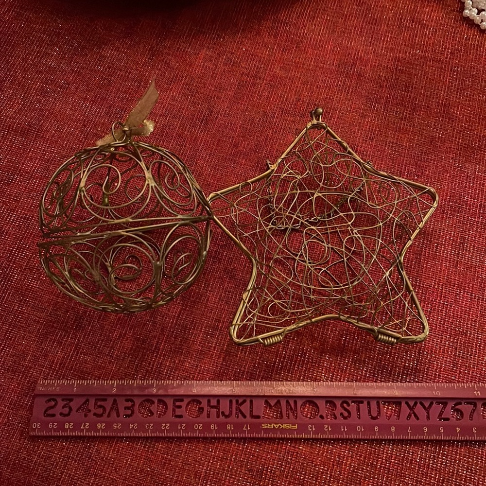 Vintage metal wire ornaments. They open to fill with whatever you can imagine
